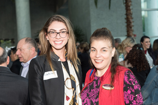 2 woman at an event